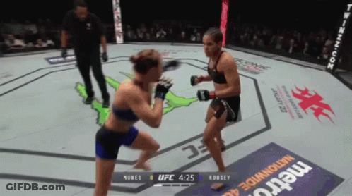 Female Wrestler Holding Belt GIF