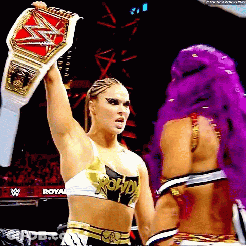 Female Wrestler Holding Belt GIF