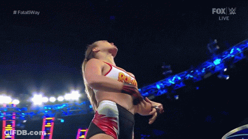 Female Wrestler Holding Rope GIF