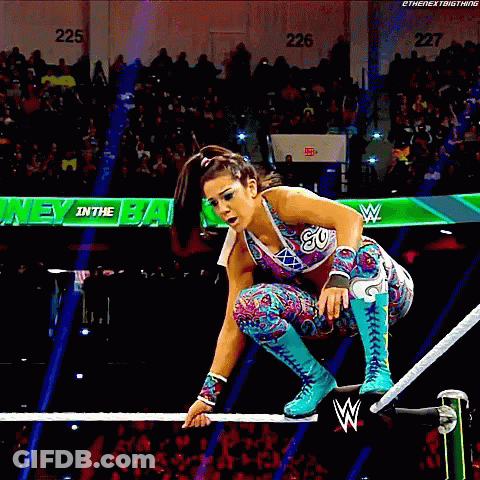 Female Wrestler Jumping Over Rope GIF