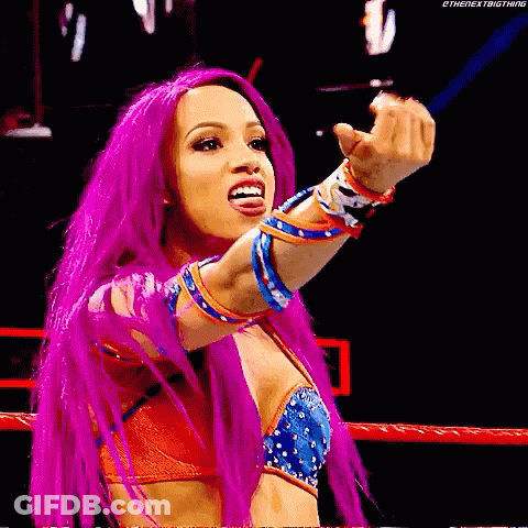 Female Wrestler With Pink Hair Giving Middle Finger GIF