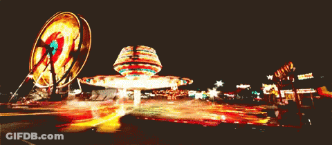 Ferris Wheel And Merry Go Round At Night GIF