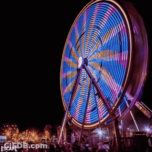 Ferris Wheel Lit Up At Night Saying Escape GIF