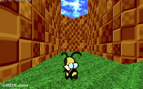 Field Of Grass And Rocks With A Tree GIF