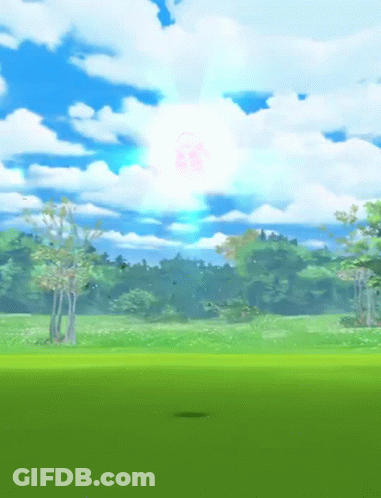 Field With Trees And Sun Through Clouds GIF
