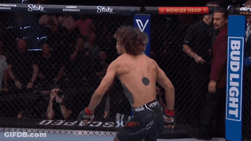 Fighter In Cage With ESPN GIF