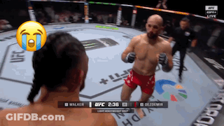 Fighter In UFC Ring With Crying Face On Head GIF