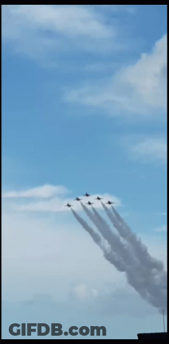 Fighter Jet Flying Behind Pilot In Helmet GIF