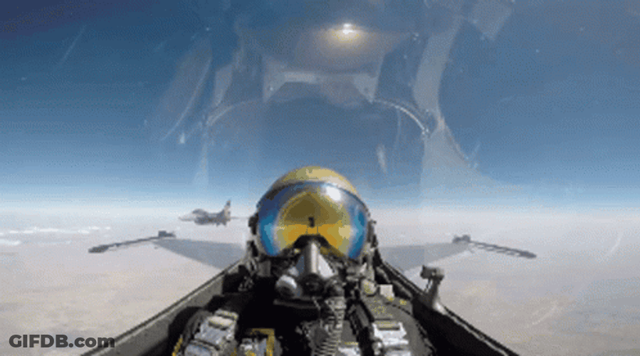 Fighter Jet Rotating On Another Jet GIF