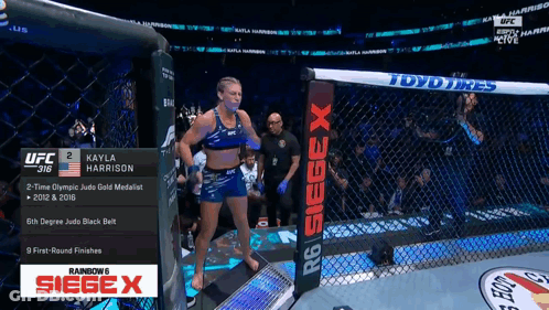 Fighter Kayla Harrison Standing In Ring GIF