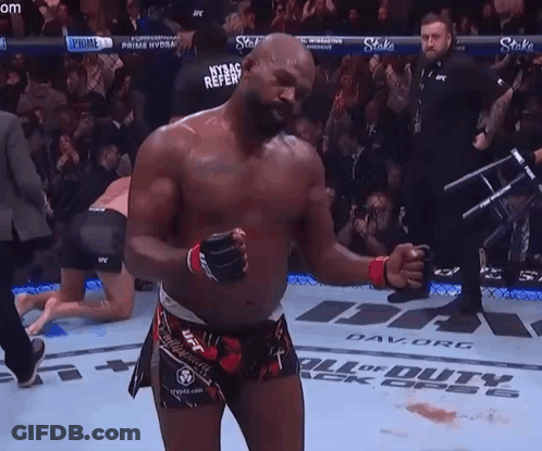 Fighter Standing In Front Of Duty Banner GIF