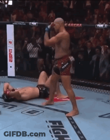 Fighter Wearing Punch Shorts Kicking Opponent GIF