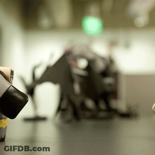 Fighting Figures Batman Superman GIF