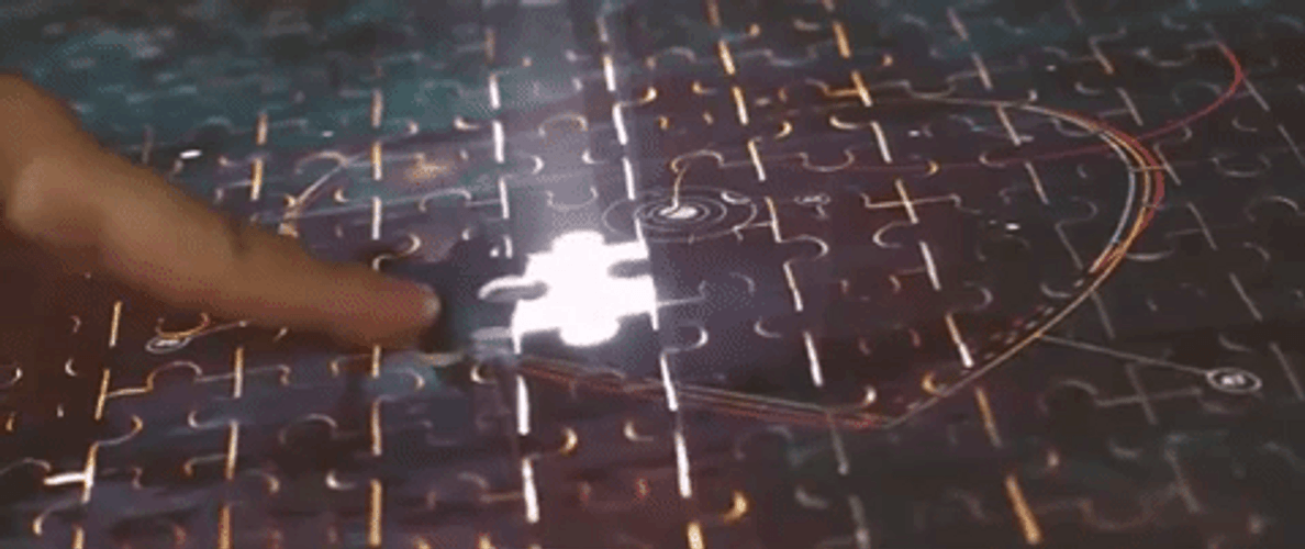 Finger Placing Last Puzzle Piece GIF