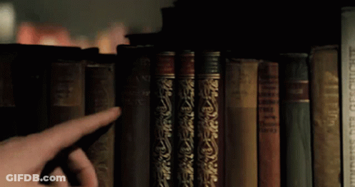Finger Pointing At Book A Brief History GIF