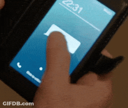 Finger Pointing At Cell Phone Screen Saying 22:31 GIF