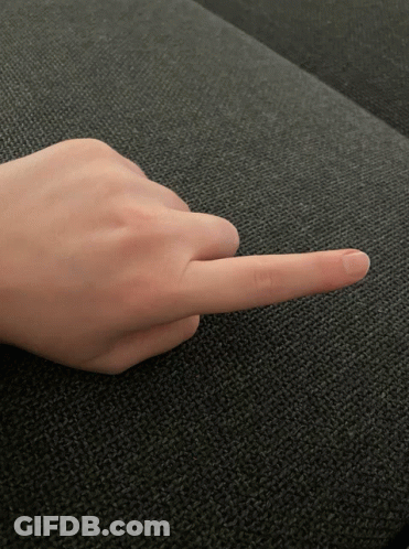 Finger Pointing Left On Couch GIF