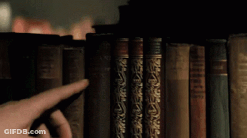 Finger Pointing To Bible GIF