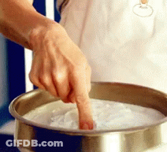 Finger Sticking Out Of Bowl Of White Liquid GIF