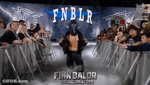 Finn Balor The Judgment Day Is A Wrestler That Is Standing In Front Of A Crowd GIF