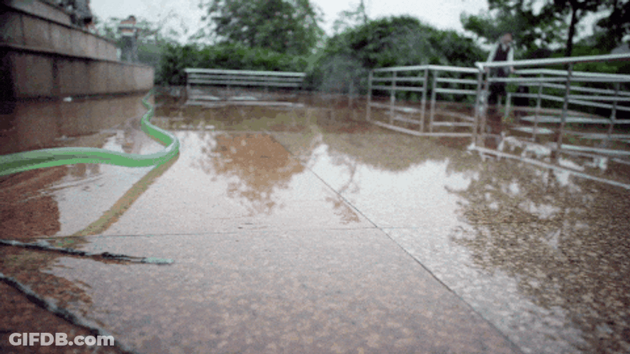 Fire Hose Splash Water On Camera GIF