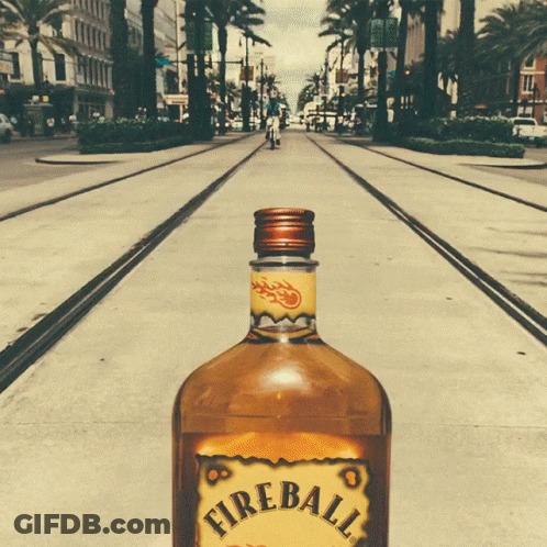 Fireball Bottle On Sidewalk GIF