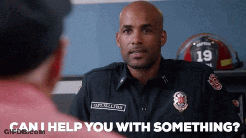 Firefighter Talking To Man GIF