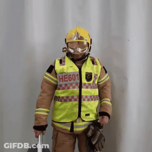 Firefighter With Stop Signage GIF