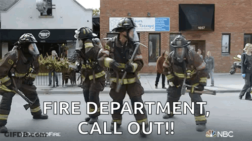 Firefighters Standing With Fire Department Call Out Sign GIF