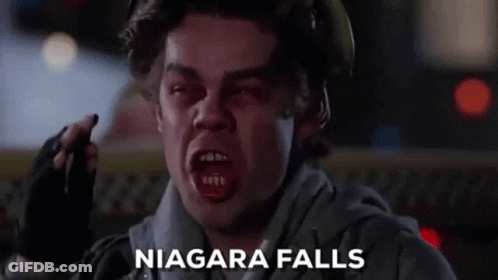 Fireman Holding Walkie Talkie Making Face GIF