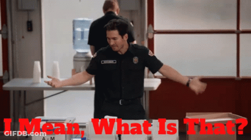 Fireman Standing In Front Of A-M Sign GIF