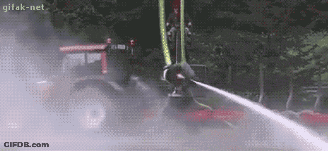 Fireman Swing Around Using Fire Hose GIF