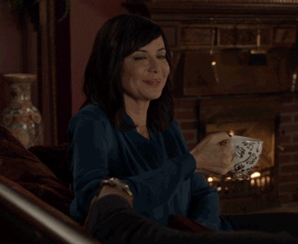 Fireplace With Catherine Bell GIF