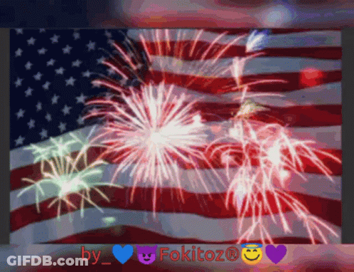 Fireworks Are Displayed In Front Of An American Flag With The Name Fokitoz At The Bottom GIF
