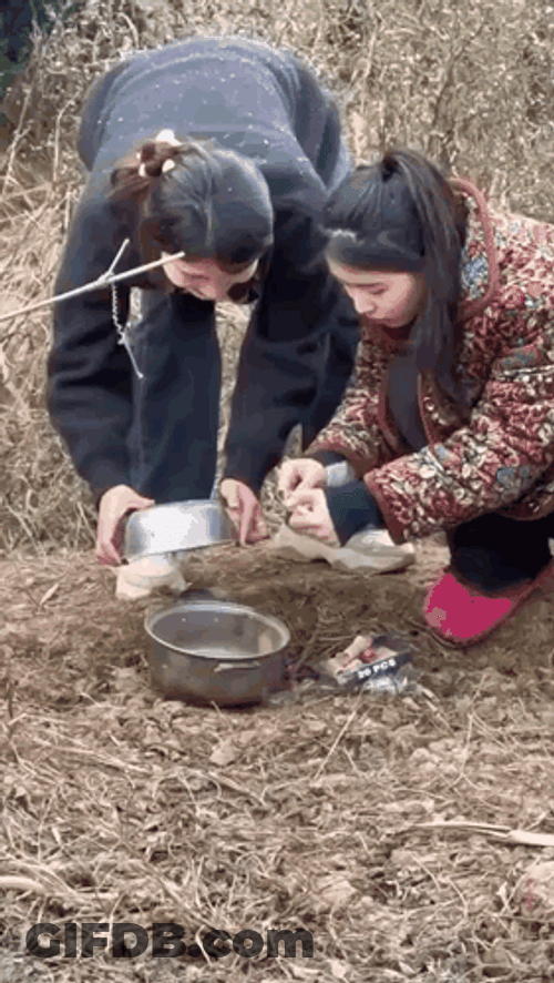 Fireworks Fail Woman Still Holding It GIF