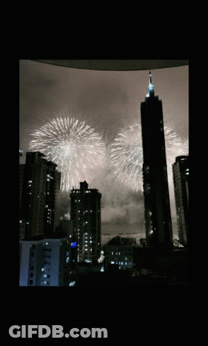 Fireworks Over City Skyline GIF