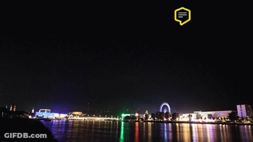 Fireworks Over Water With Yellow Speech Bubble GIF