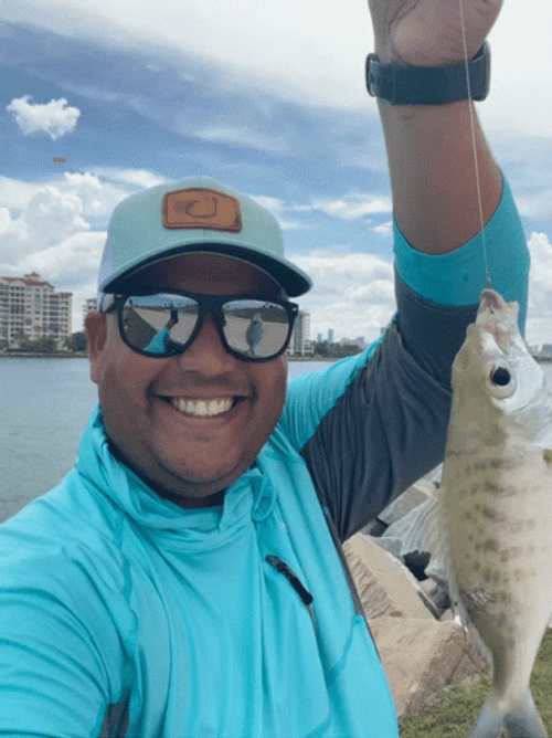 Fish Spinning On Fishing Rod GIF