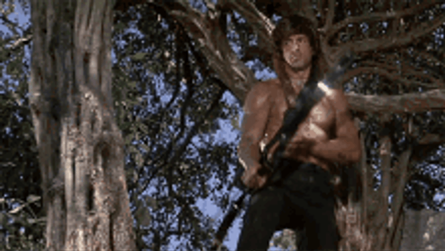 Fist Kill Film Sylvester Stallone As John Rambo Aims Bow And Arrow GIF
