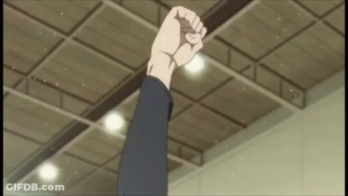 Fist Raised In Front Of Ceiling GIF
