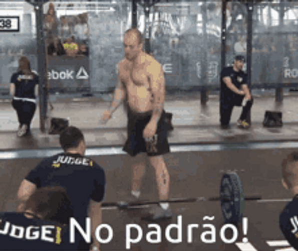 Fitness Trainer Showing Proper Burpee Exercise GIF