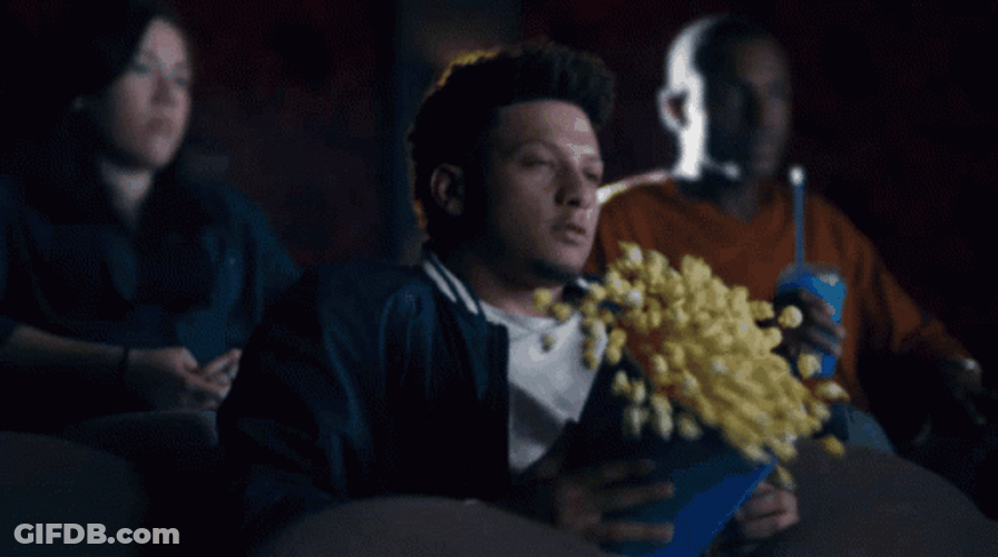 Fiunny Patrick Mahomes Spilling His Popcorns GIF