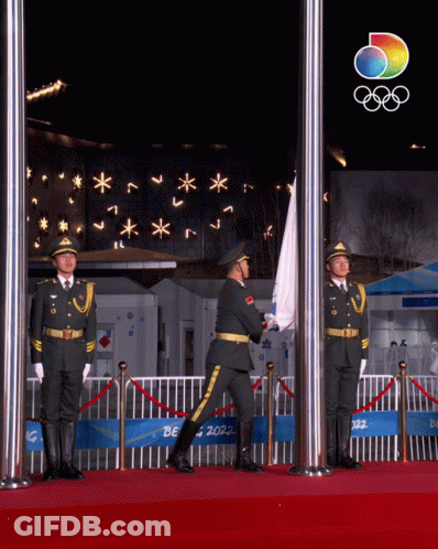 Flag Lowered In Front Of Beijing 2022 Sign GIF