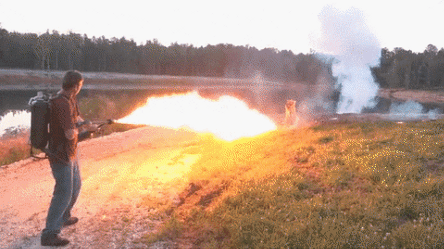 Flamethrower In The Field GIF