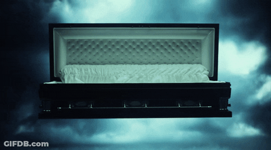 Flashing Light Coffin In Spotlight GIF