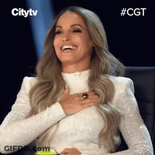 Flattered Trish Stratus GIF