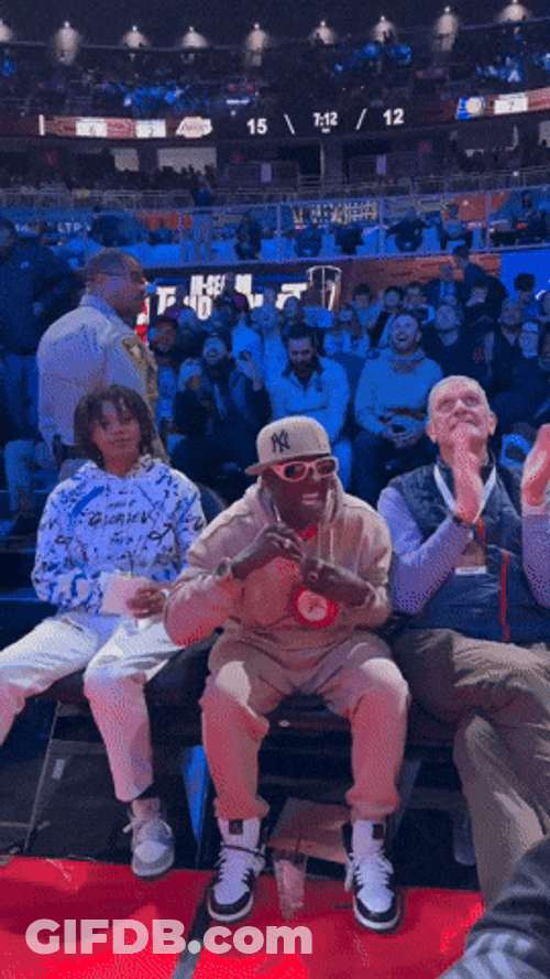 Flavor Flav In Celebrity Row At NBA Tournament GIF