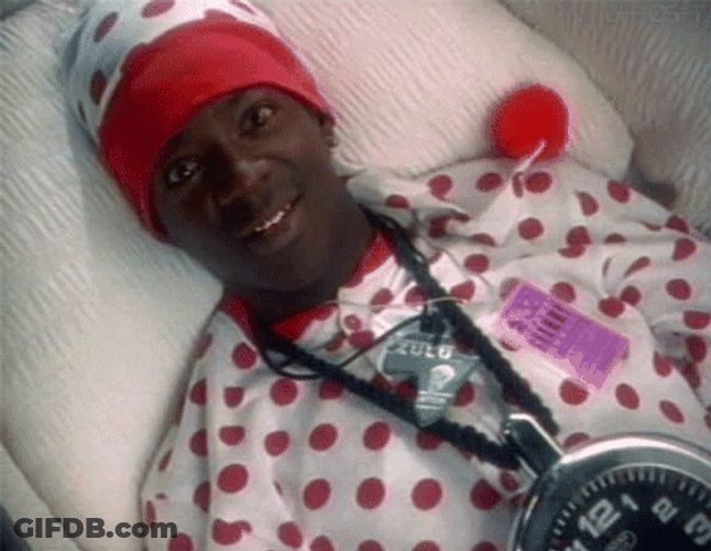 Flavor Flav Lying Down With Moving Eyes GIF