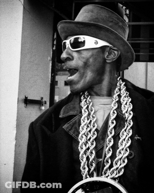 Flavor Flav Wearing Hat And Sunglasses GIF