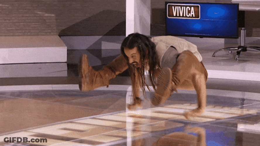Flexible Man Hang His Legs On Her Arms GIF
